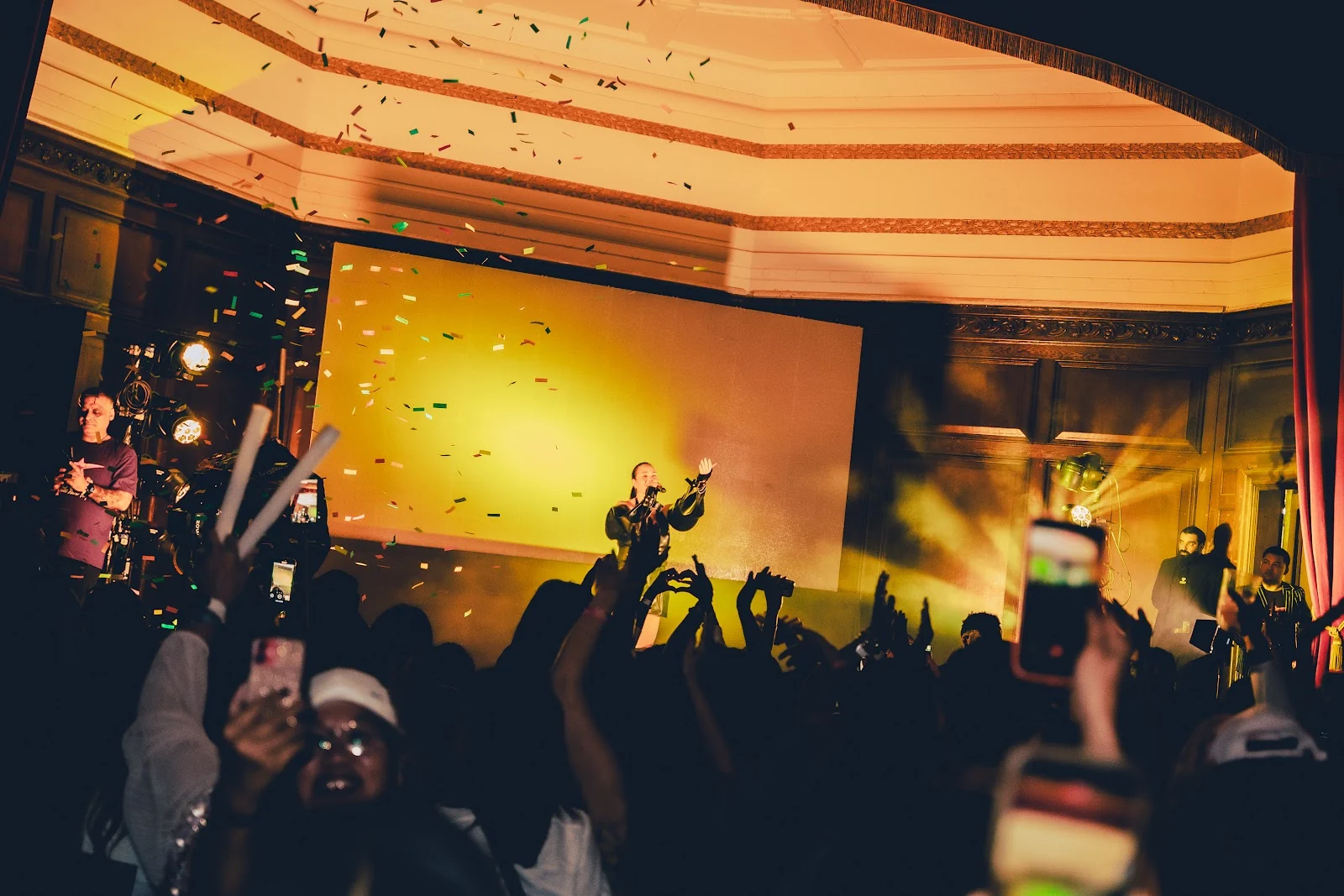Confetti falling over the stage and audience